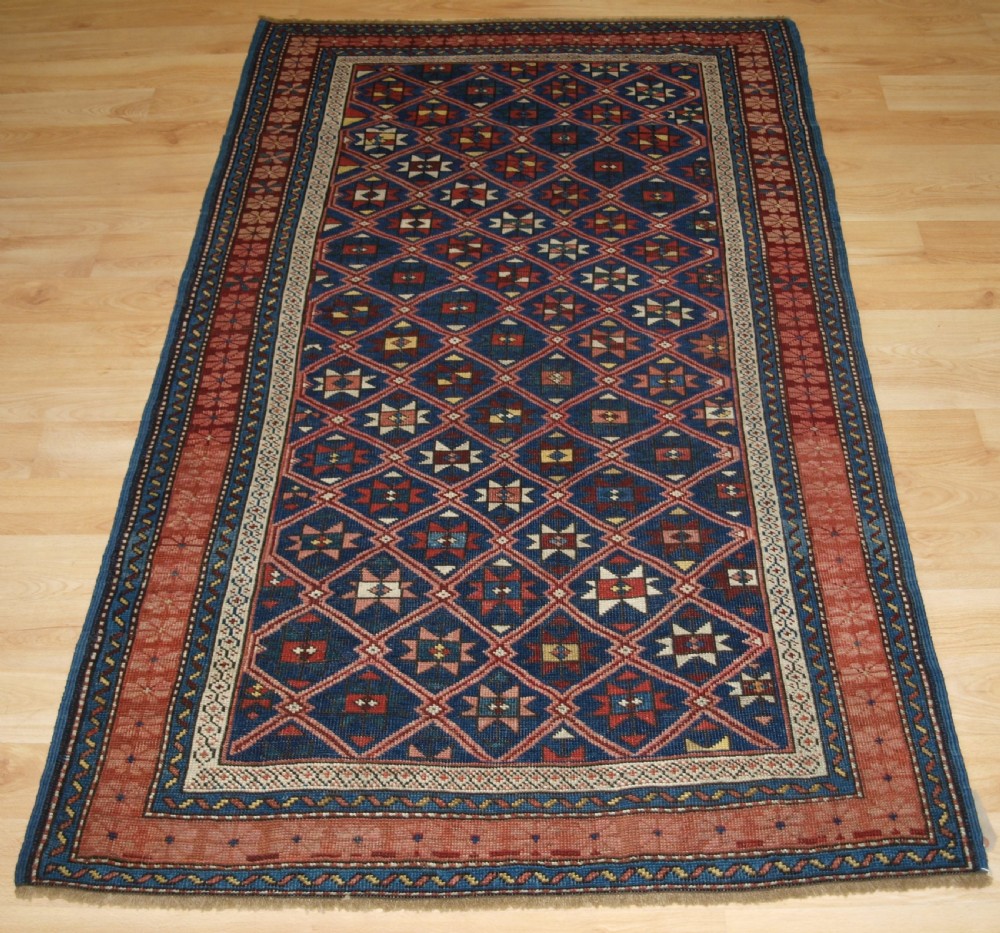 antique caucasian seichur rug with star and lattice design circa 1880