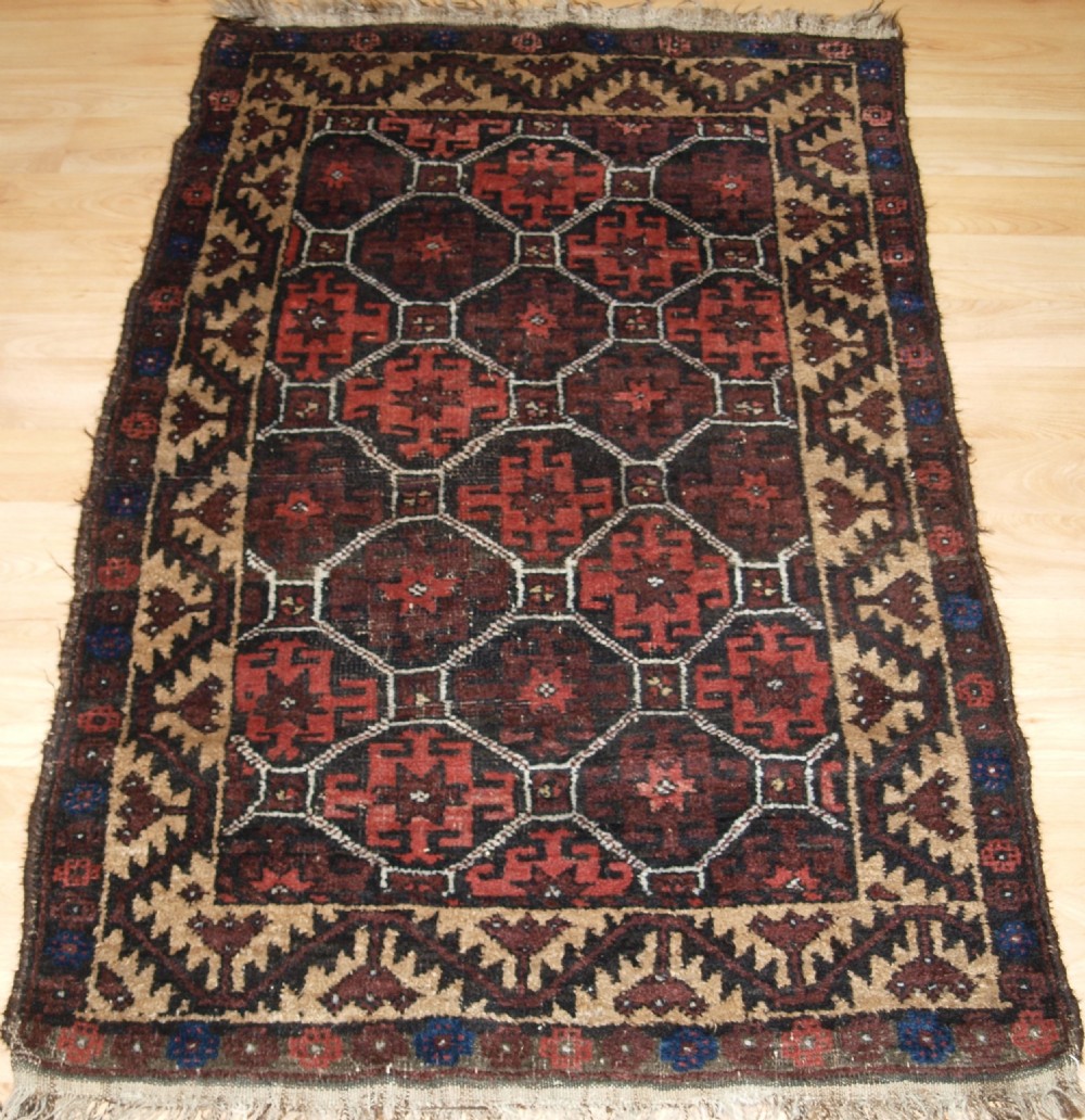 antique afghan baluch rug small size with lattice design circa 1900