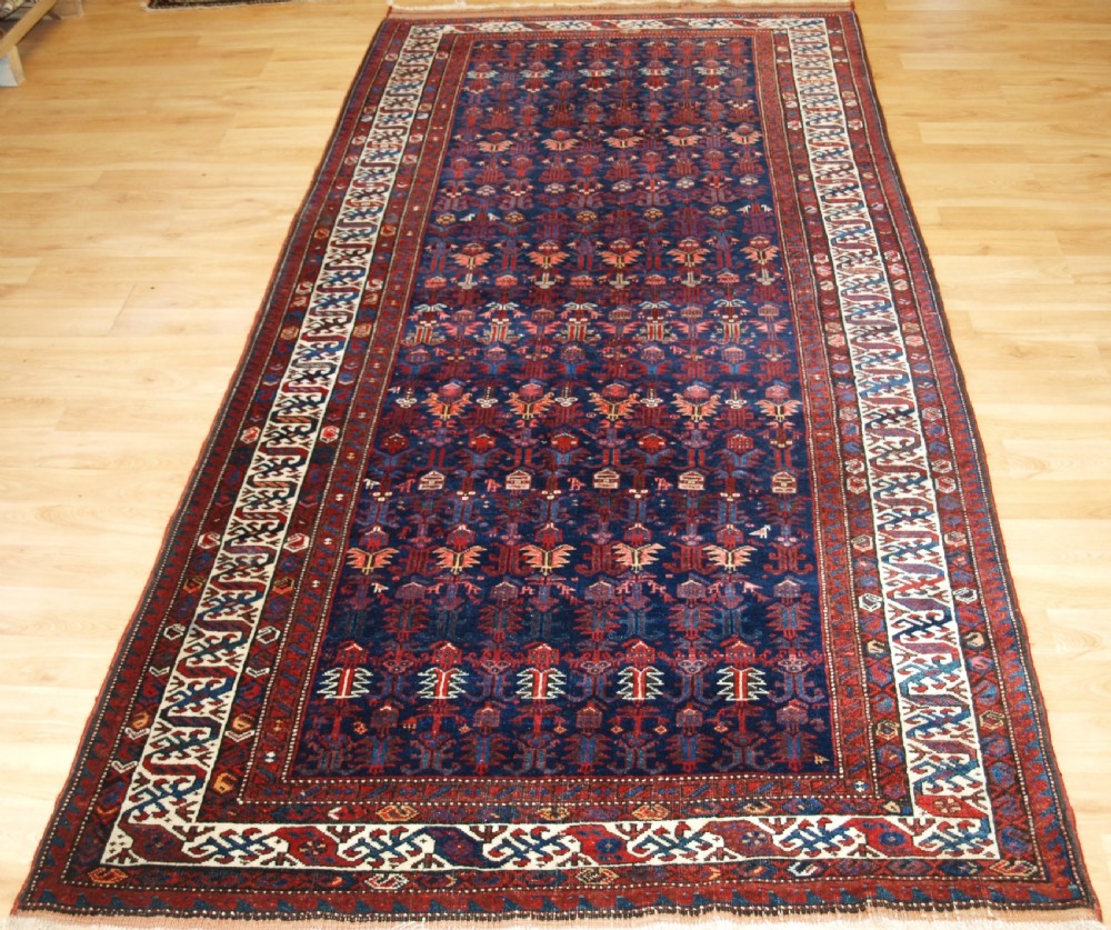 antique kurdish kelleh long rug with dragon border circa 1900
