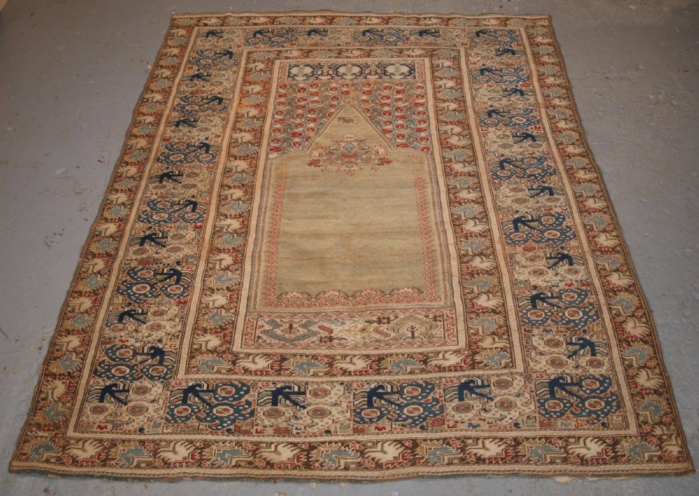 antique turkish ghiordes prayer rug green ground early form circa 1750