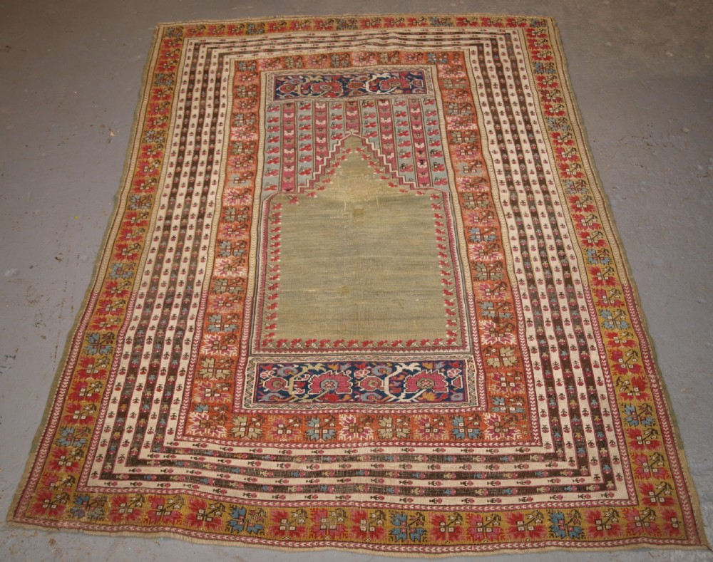 antique turkish ghiordes prayer rug multiple borders green field circa 1800