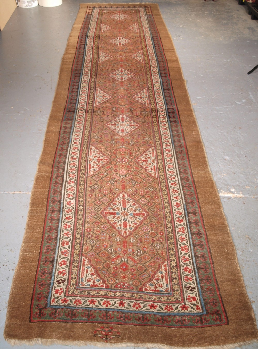 antique sarab runner with camel ground soft colours circa 1880