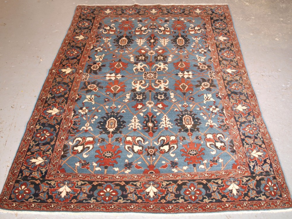 antique tabriz rug with safavid inspired vase design circa 1920