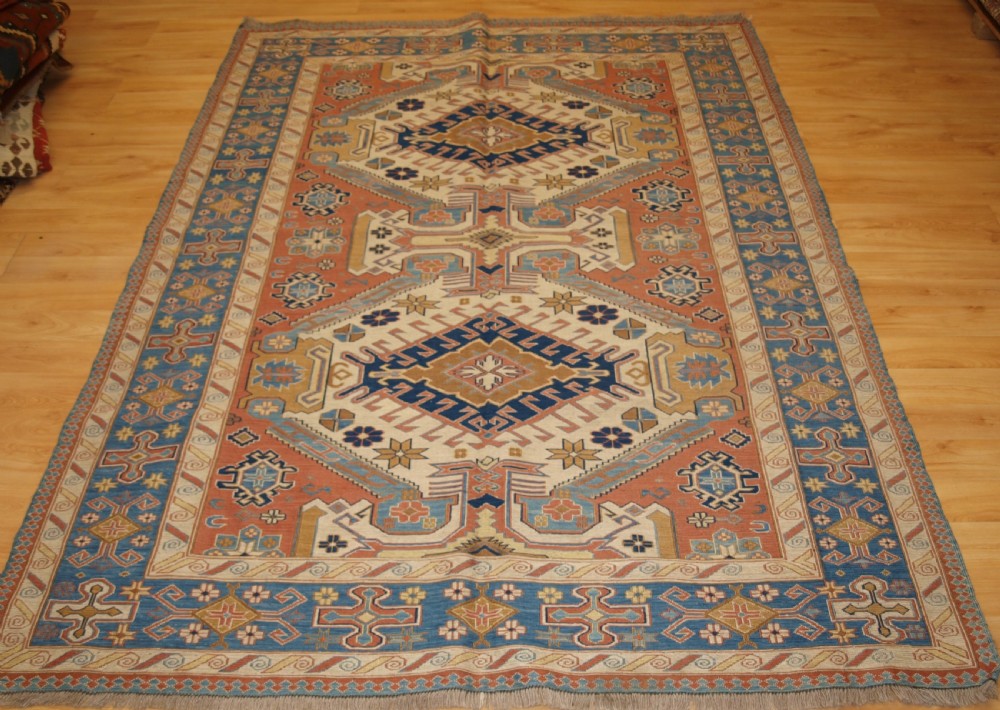 old afghan soumak kilim in pastel colours with caucasian design about 10 years old