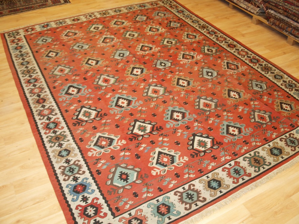 antique sharkoy kilim with large repeat design pastel colours circa 1920
