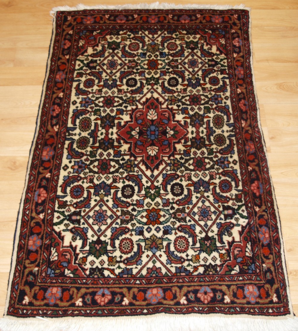 old hamadan region rug of small size with herati design circa 1930