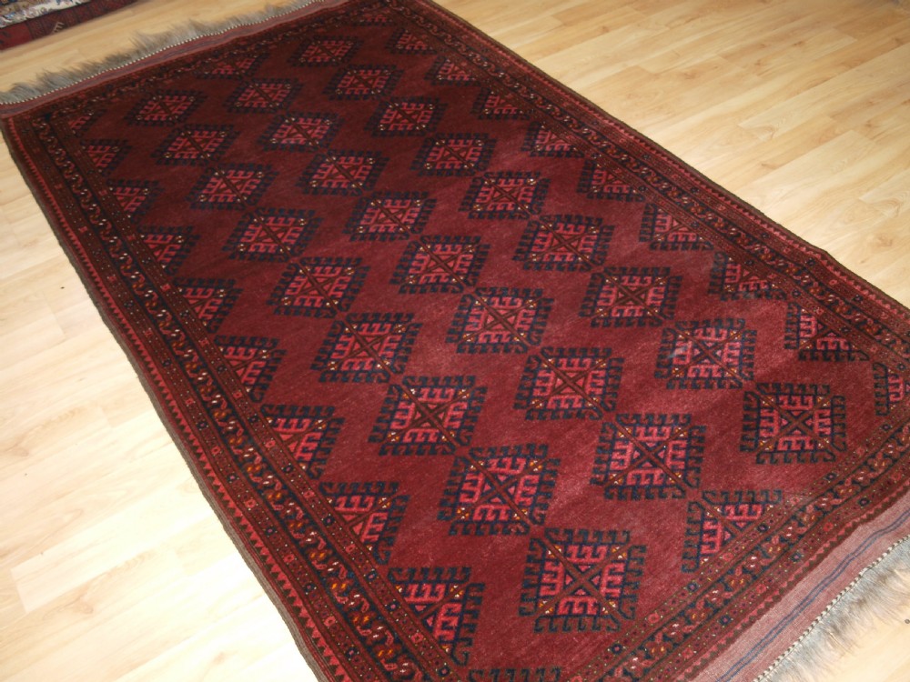 old afghan village rug with turkmen style design circa 1920