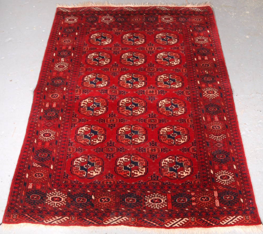 old afghan village rug hard wearing rich red colour circa 1920