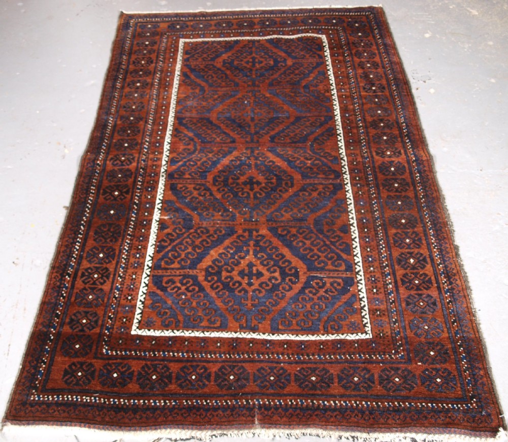 antique afghan baluch rug with mushwani design circa 190020