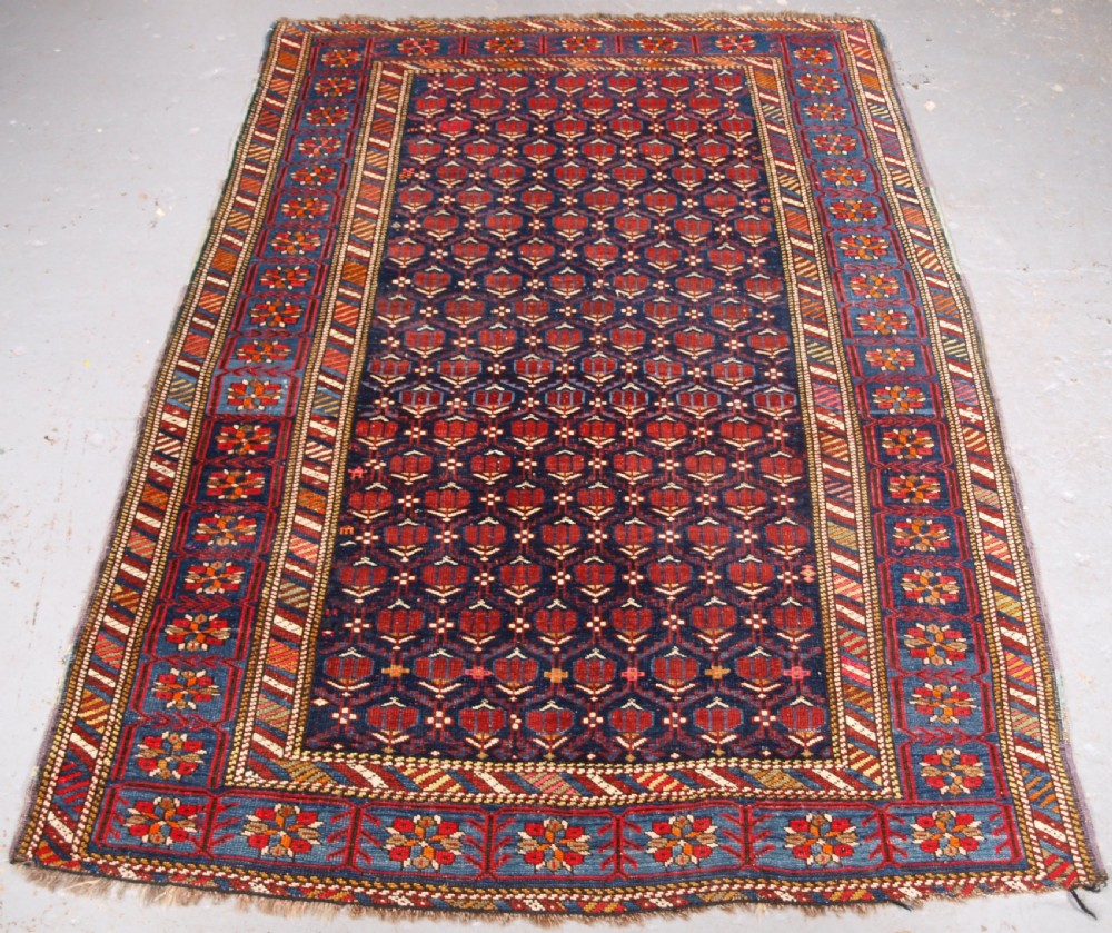 antique caucasian daghestan rug with tulip latice design circa 190010