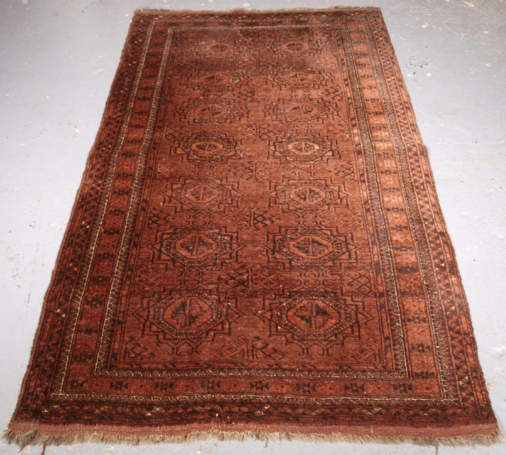 antique afghan village rug turreted gul design circa 1920
