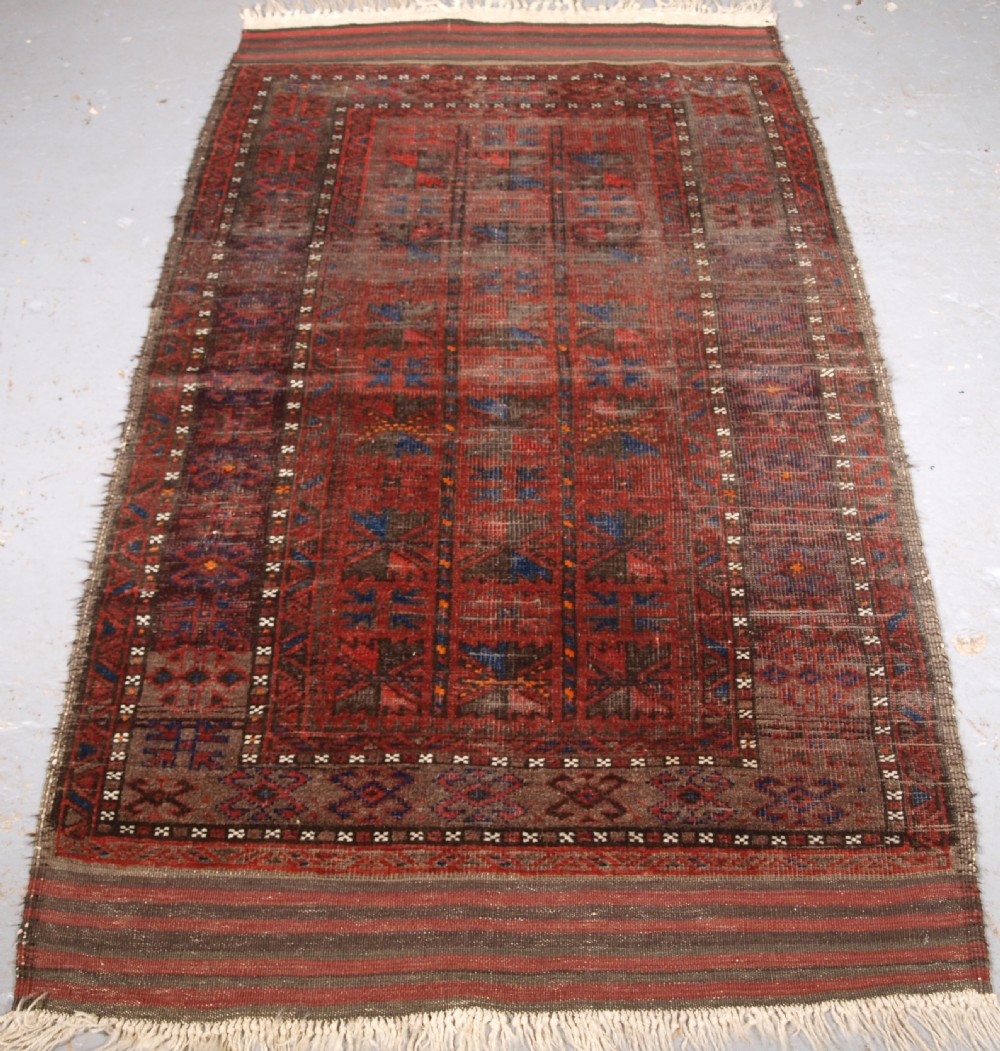 antique baluch rug with repeat leaf design long kilim ends circa 1890