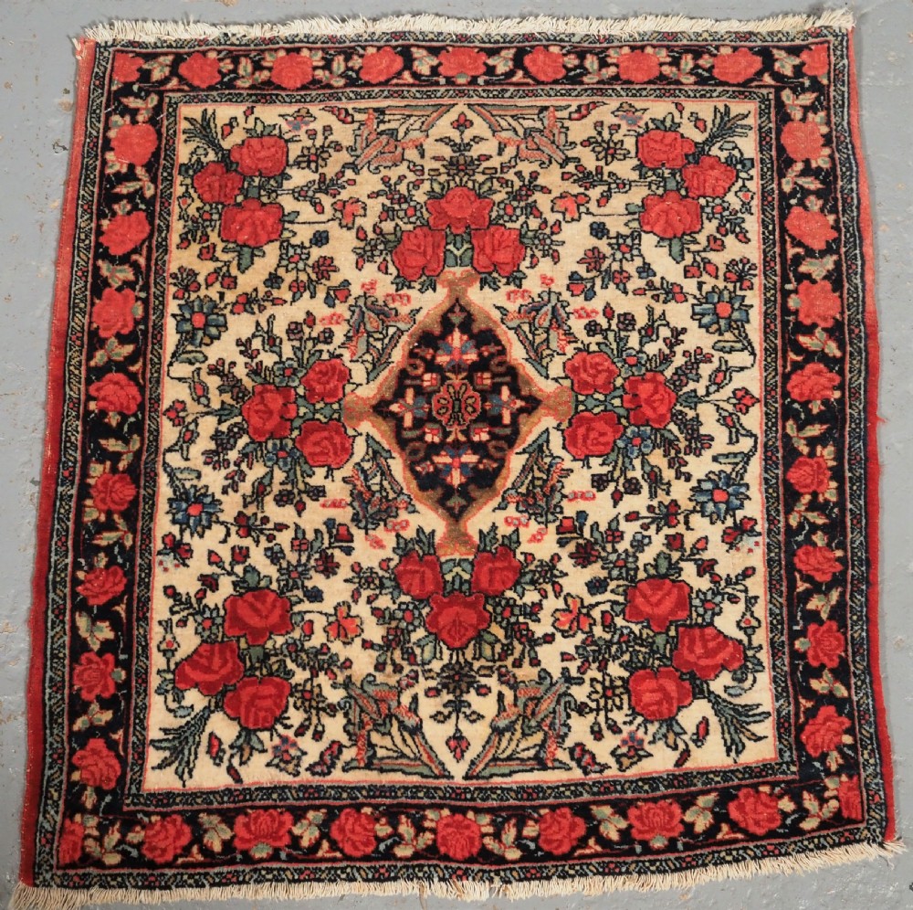 antique bijar rug of small square pushti size floral design circa 1890