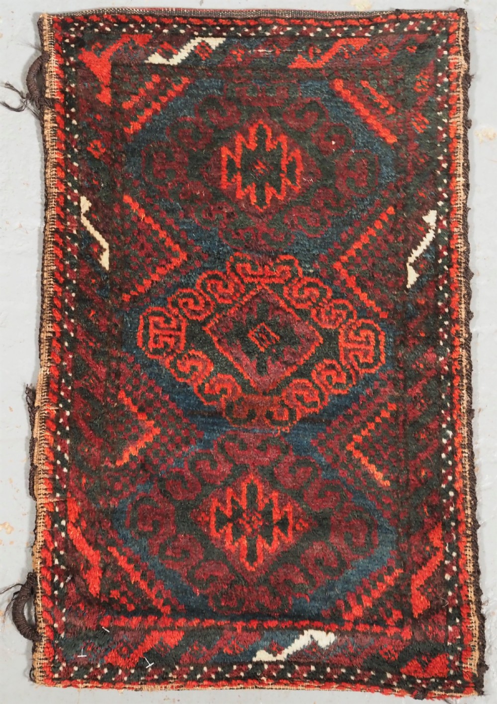 antique mushwani baluch pushti with plain weave back circa 1900
