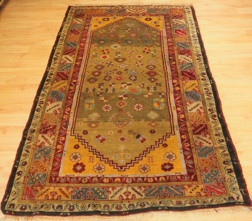 antique turkish milas rug with scarce green ground circa 1875