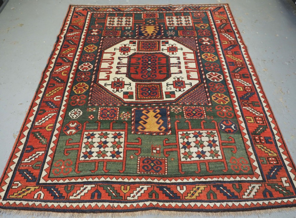 antique caucasian karachov kazak rug with green ground circa 1890