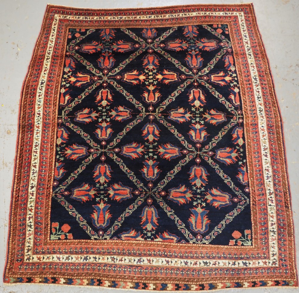 antique afshar tribal rug with lattice and tulip design circa 1890