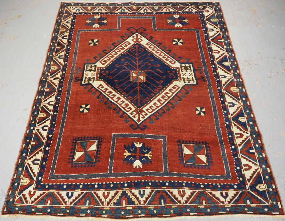 antique caucasian fachralo kazak prayer rug of large medallion design circa 1880