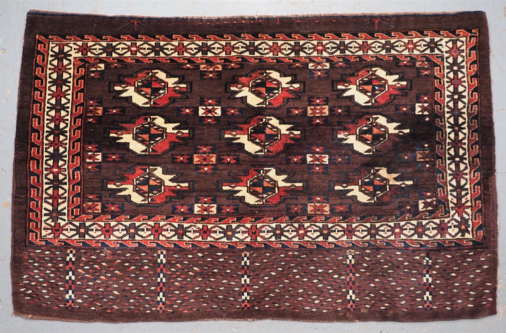 antique yomut turkmen 9 gul chuval complete with back circa 1900