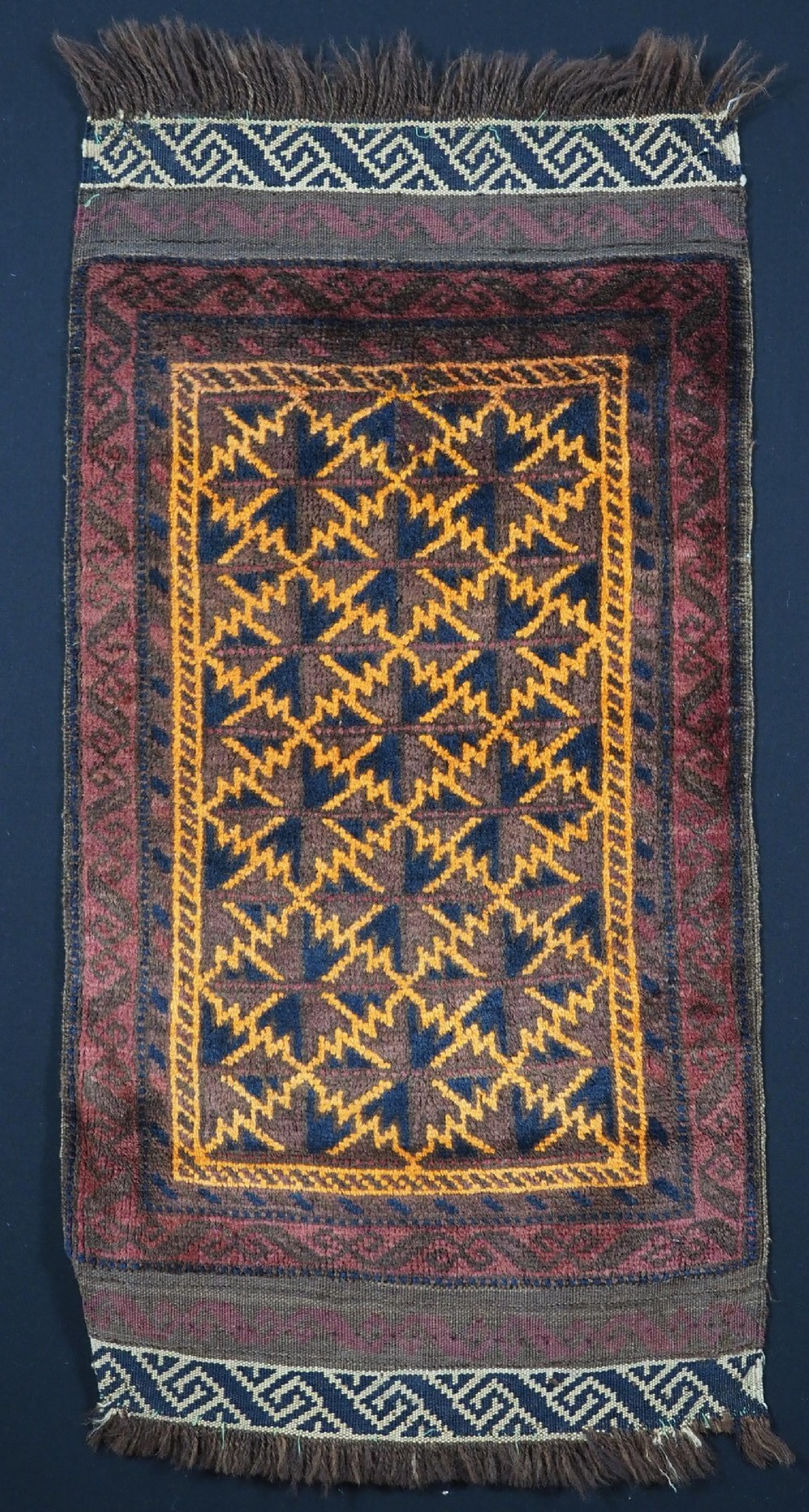 antique baluch pushti face with lotus leaf design circa 1900