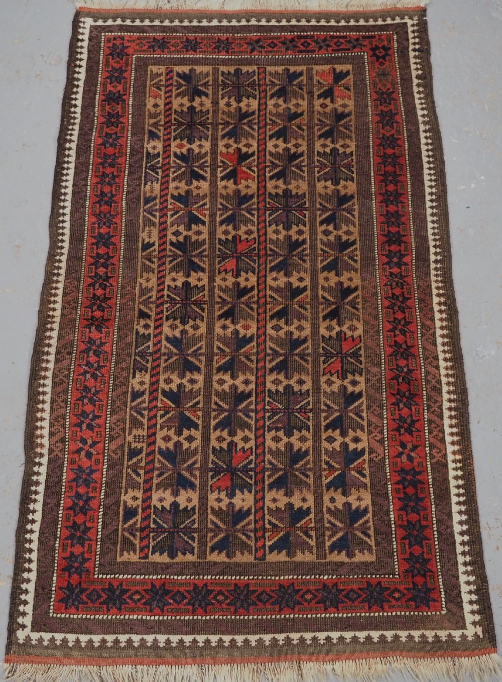 antique baluch rug with repeat lotus leaf design circa 1900