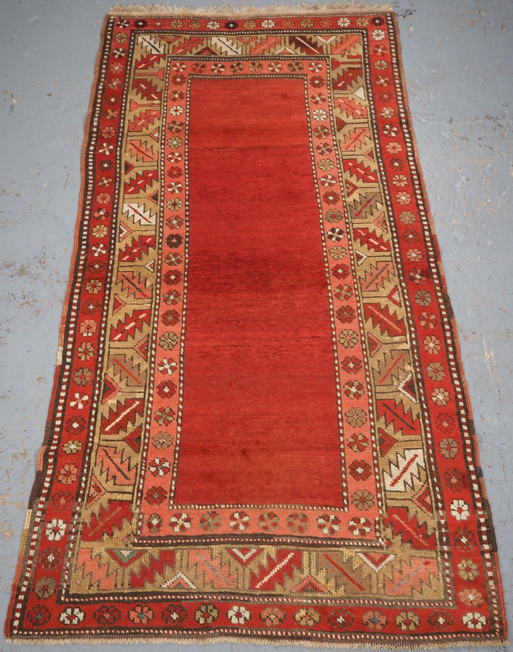antique turkish terekeme kazak rug with plain field circa 1910