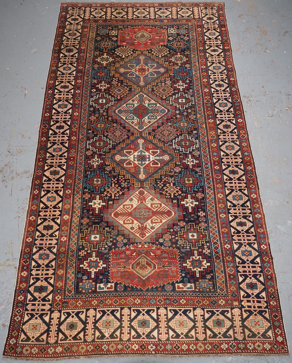 antique caucasian shirvan rug superb design with kufic border circa 1880