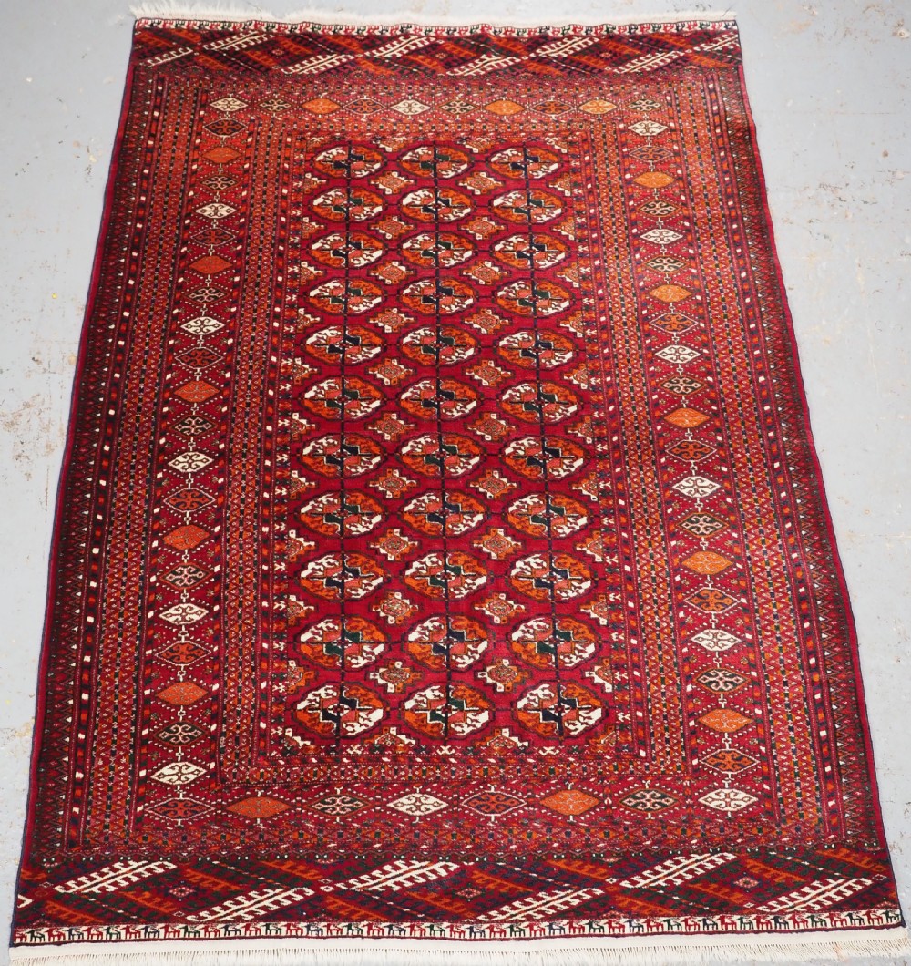 old tekke turkmen rug rows of small animals circa 192030