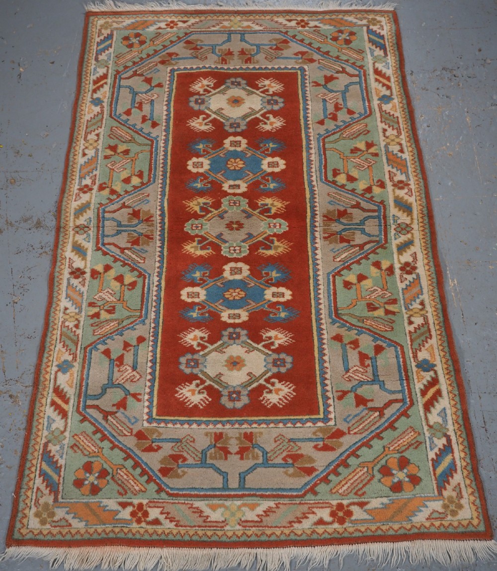 old turkish milas rug traditional design with soft colours circa 1960