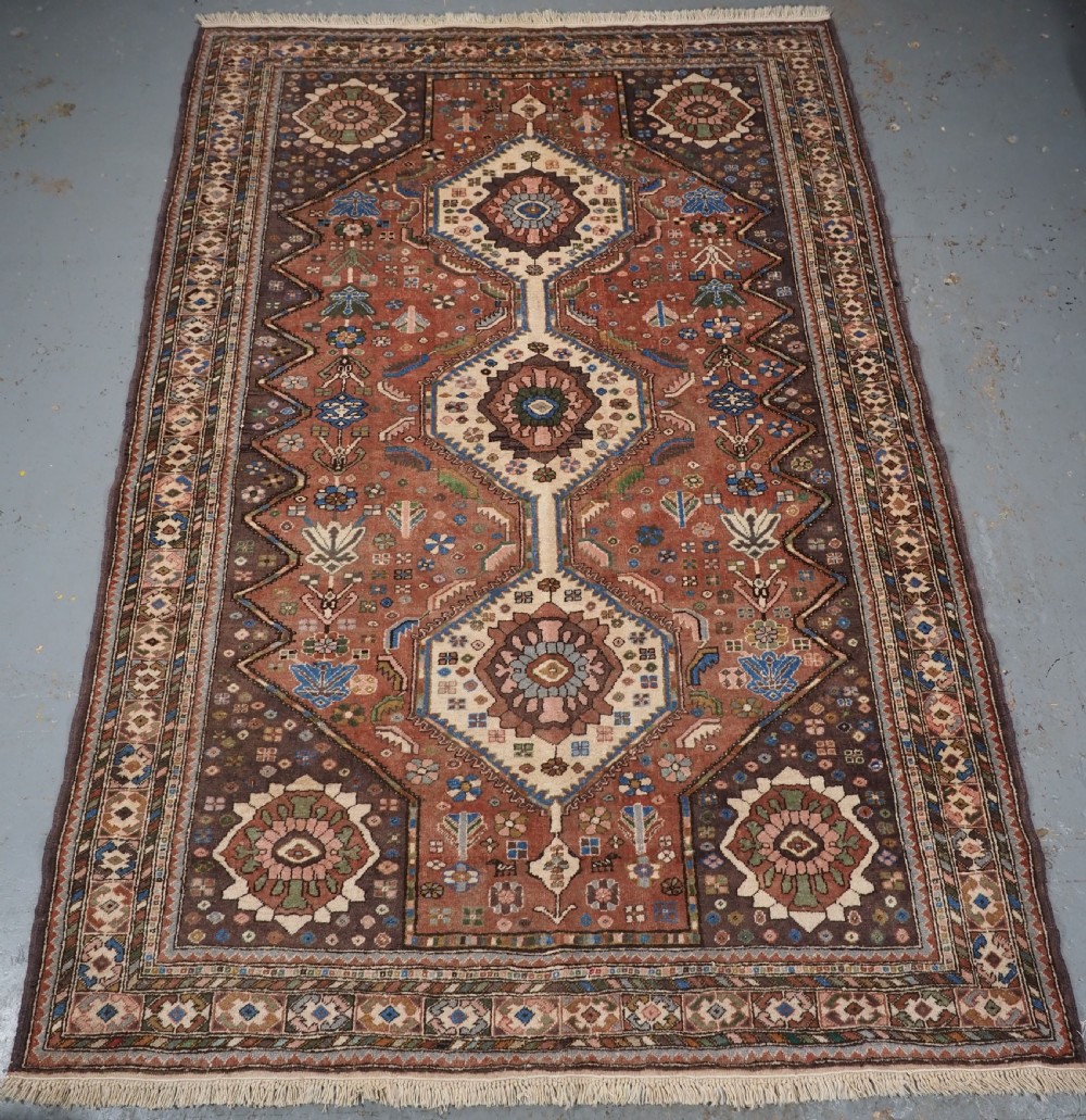 old abedeh village rug of tribal design soft colours circa 1930