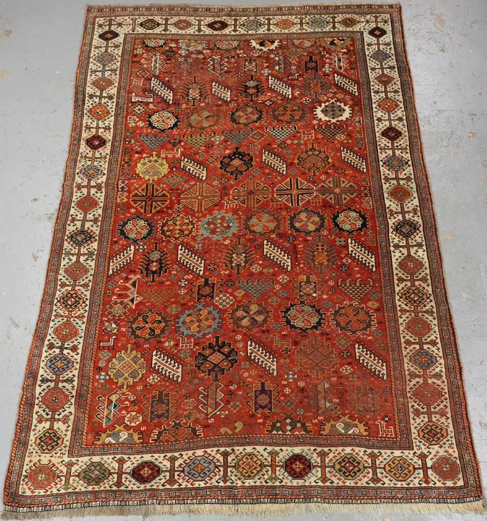 antique tribal shekarlu qashqai rug with red ground circa 1880