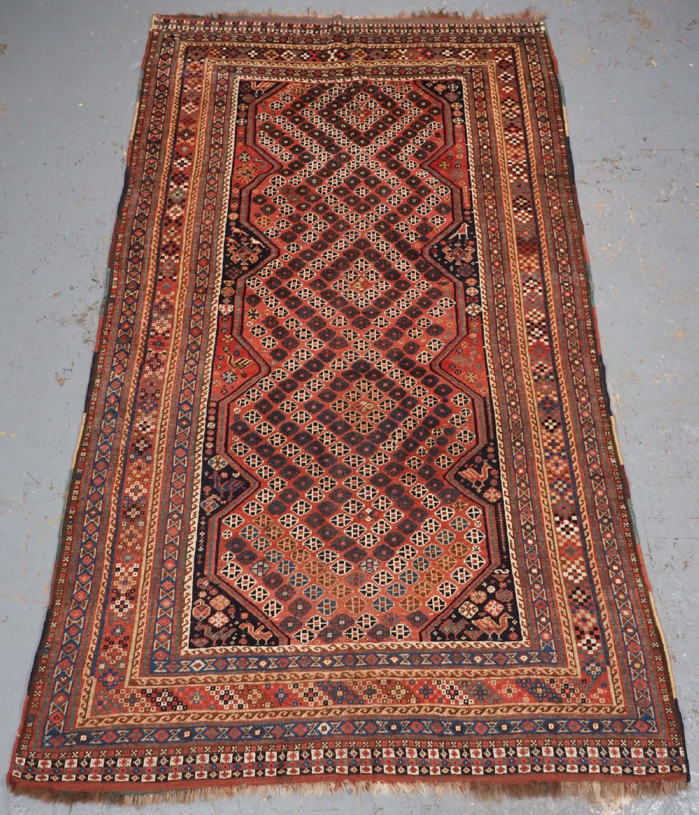 antique tribal qashqai rug with diamond lattice design circa 1880