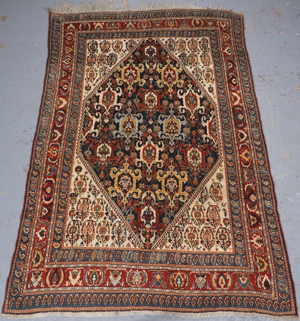 antique qashqai kashkuli rug with repeat medallion design circa 1900