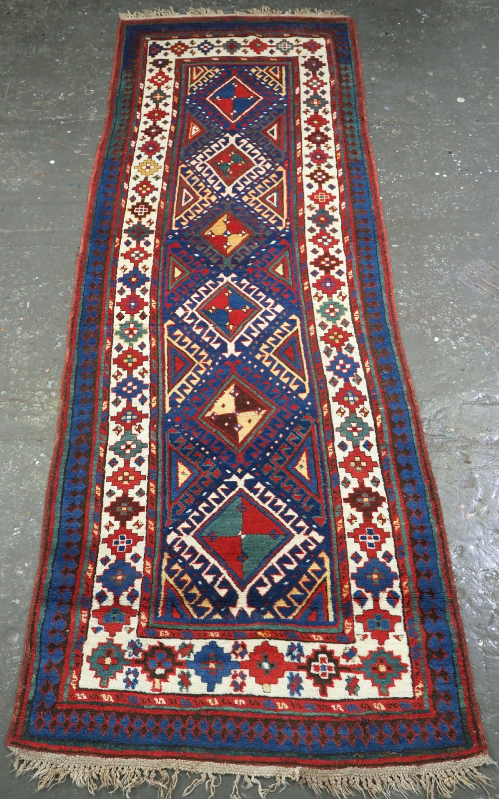 antique caucasian moghan kazak long rug runner with hooked medallion design circa 1880