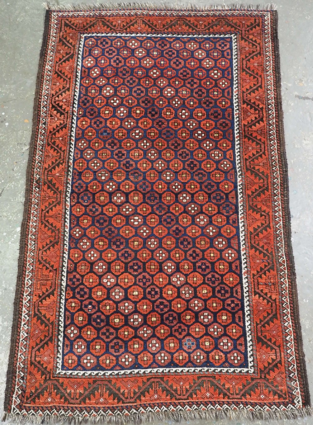 antique baluch rug with scarce repeat small octagon design circa 1900