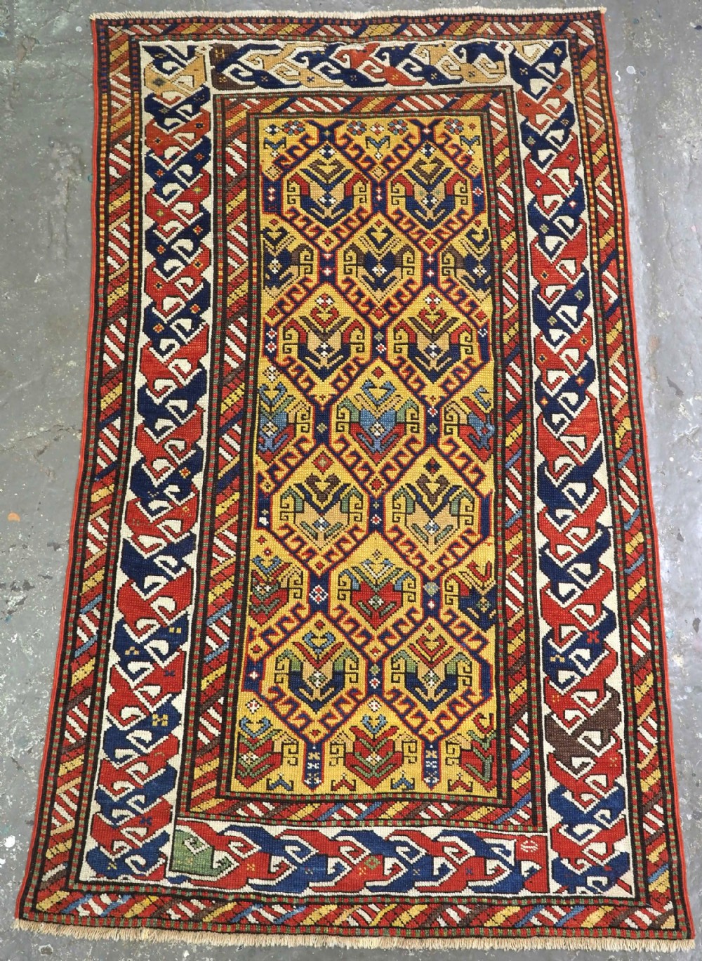 antique caucasian dagestan rug with lattice design on a yellow ground circa 1890