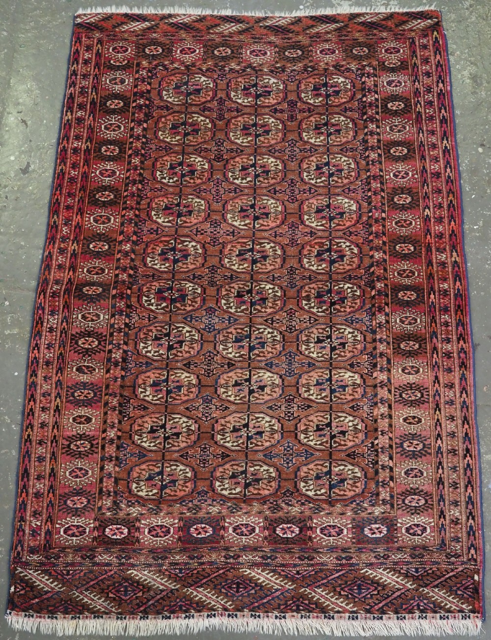 antique tekke turkmen rug soft colour with cochineal highlights circa 1900