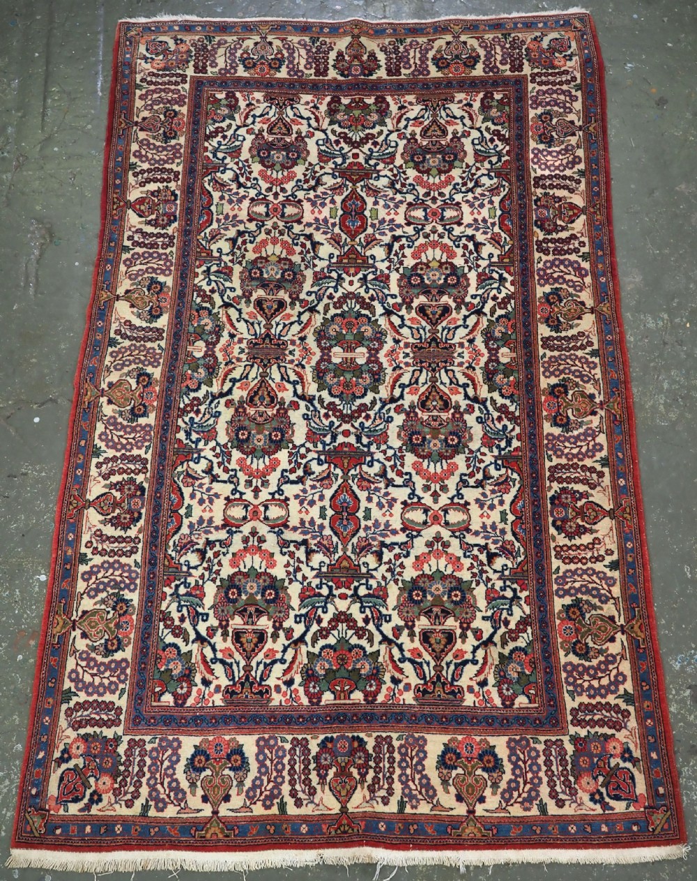 antique kashan rug with flower and vase design circa 1920