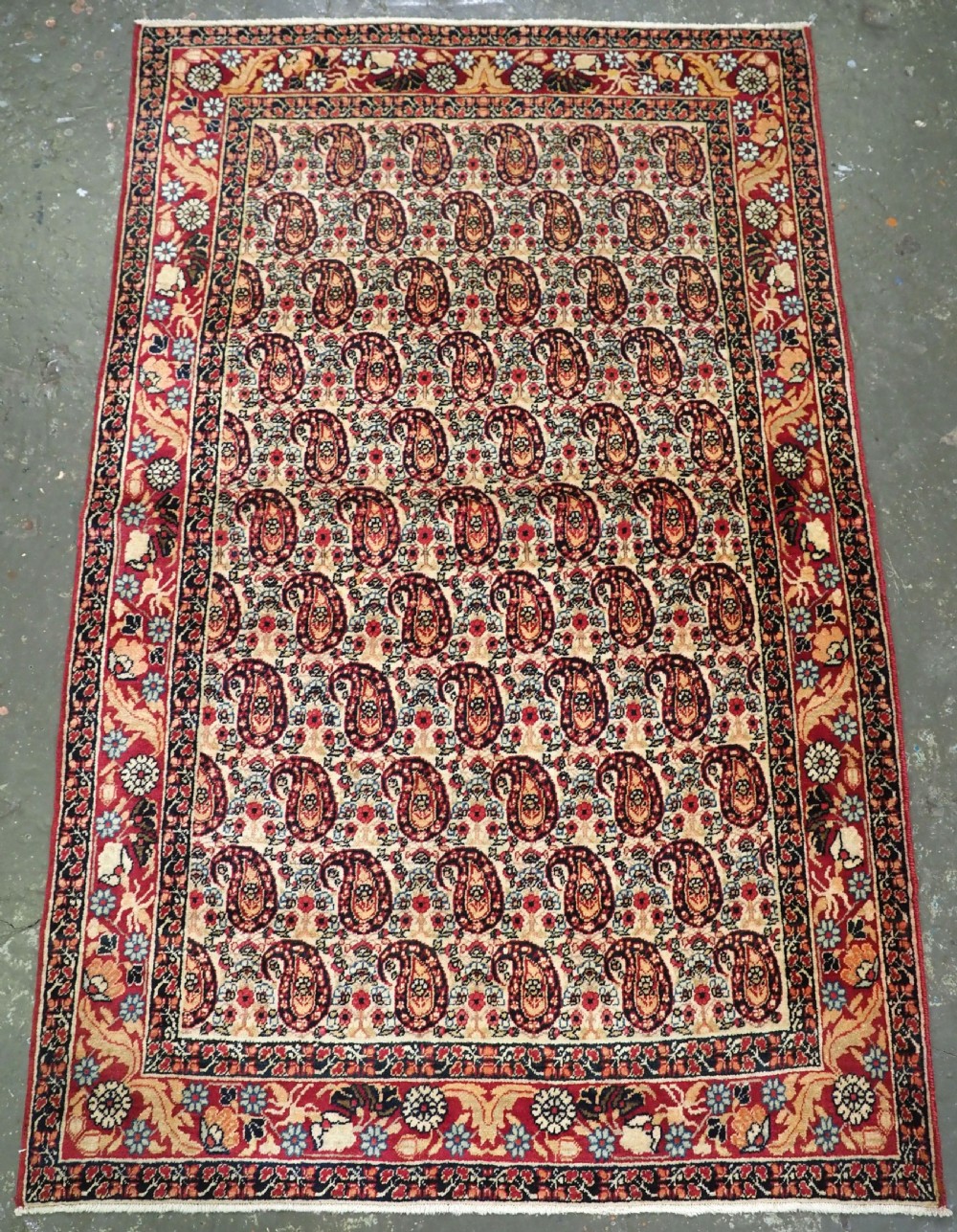 antique kirman rug of small size all over boteh design circa 190020