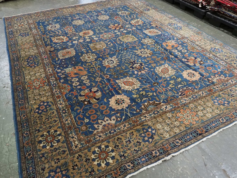 antique 'benlian' tabriz carpet with 'vase' design outstanding colour circa 190020