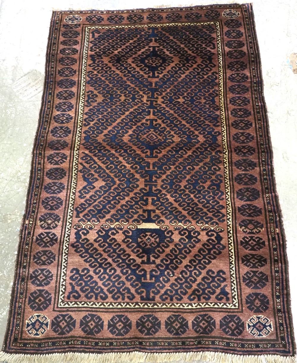 antique afghan adraskhan baluch rug with 'mushwani' design circa 190020