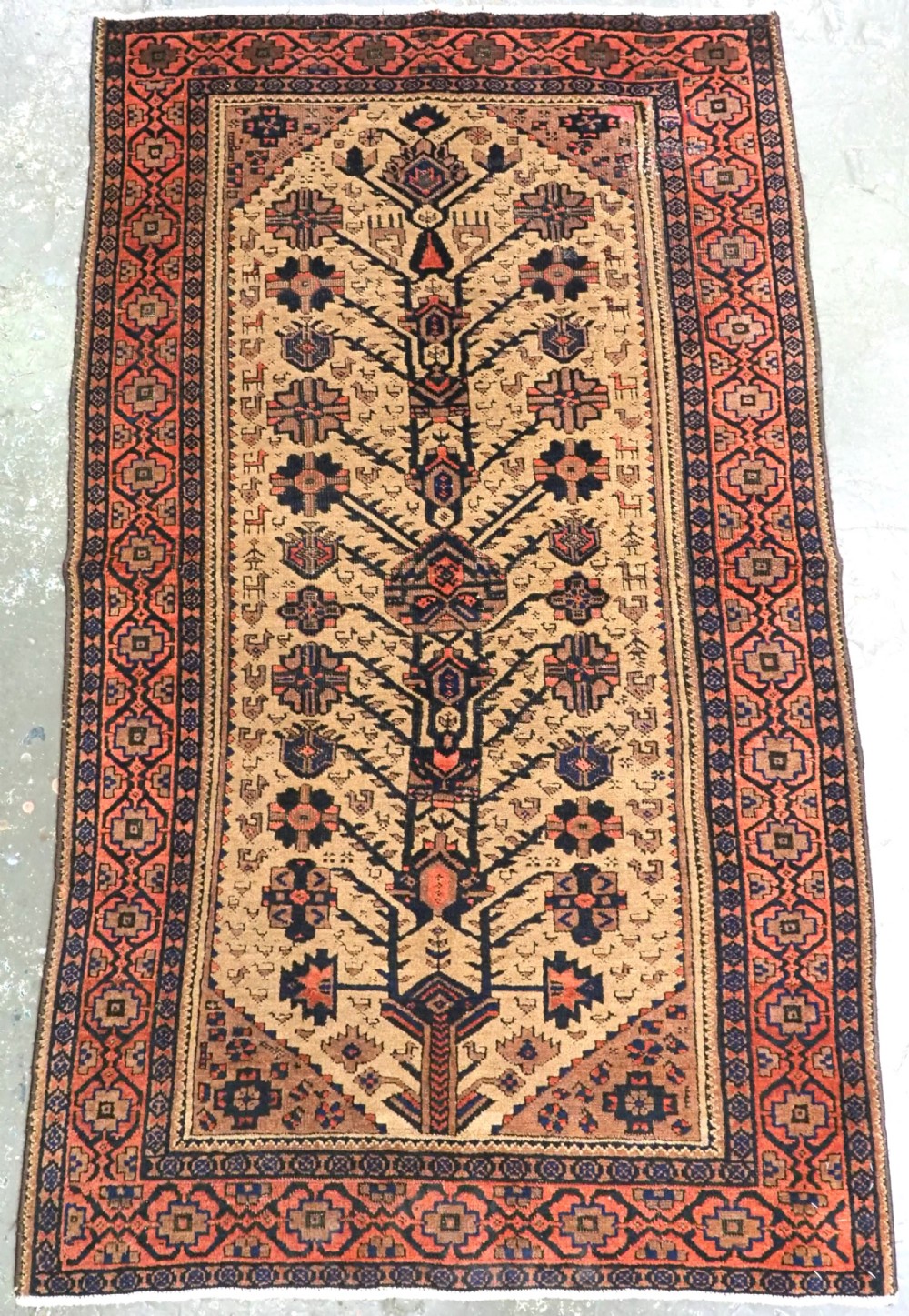 antique baluch ferdows region rug camel ground tree design late 19th century