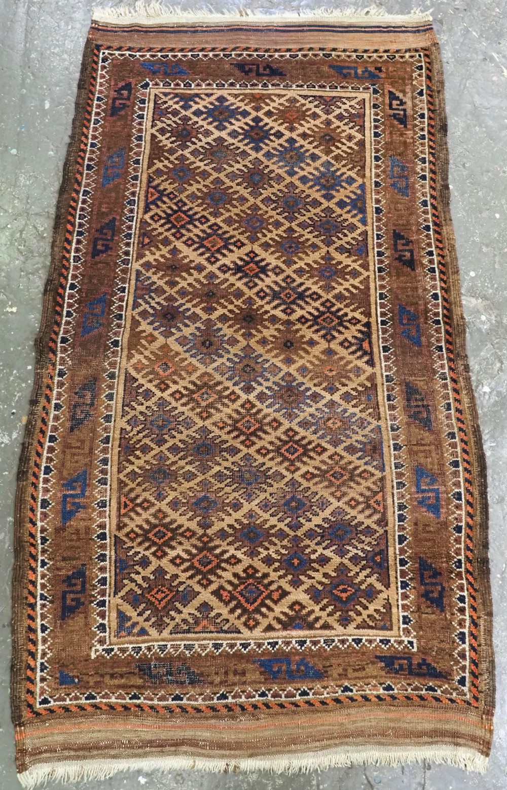 antique khorasan baluch rug camel ground star gul design circa 1890