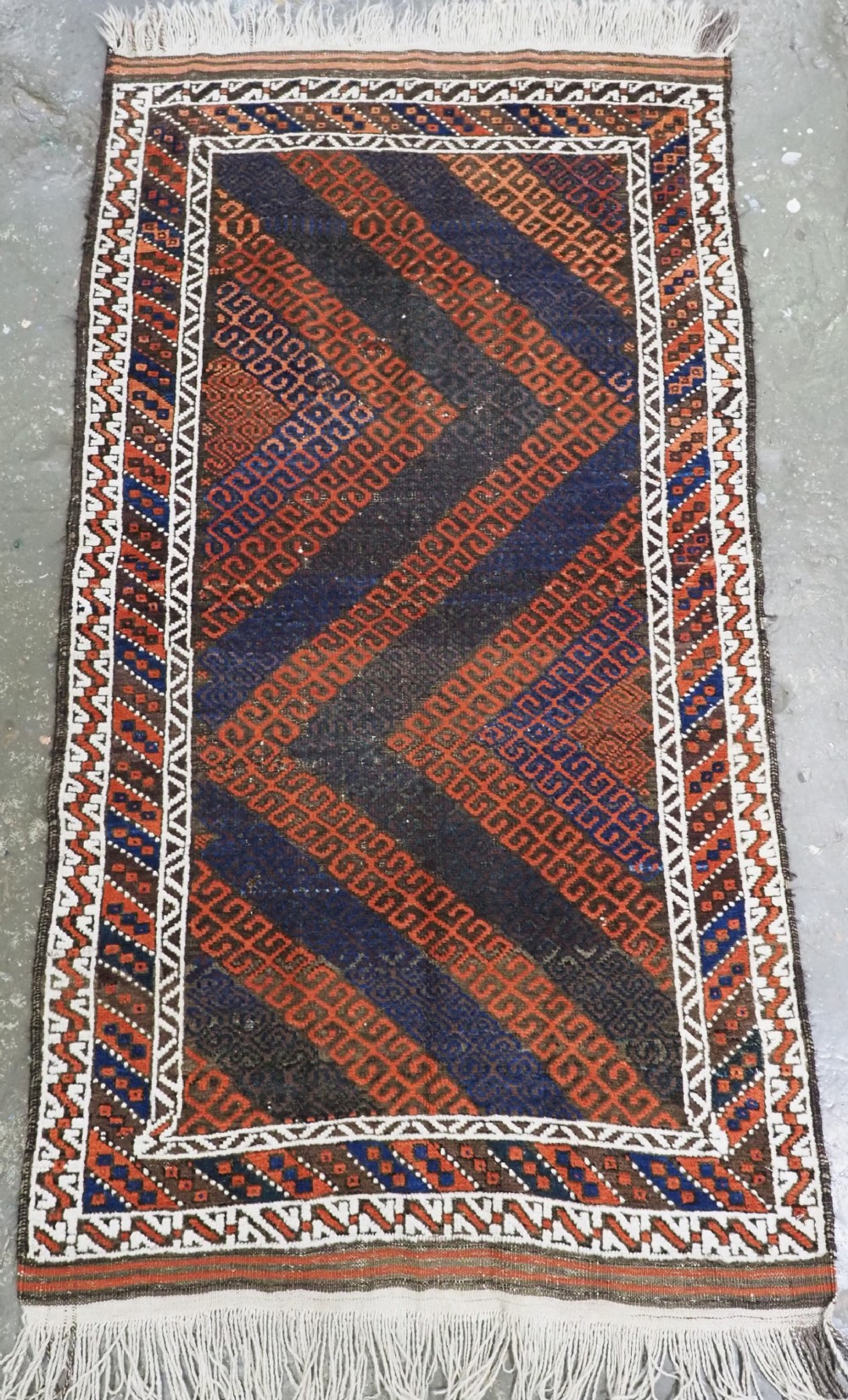 antique baluch rug with mushwani type design herat region circa 1900