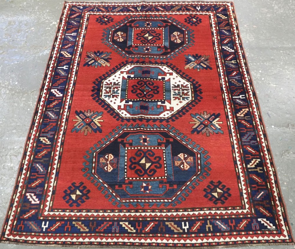 antique caucasian triple medallion kazak a visually striking rug circa 1880