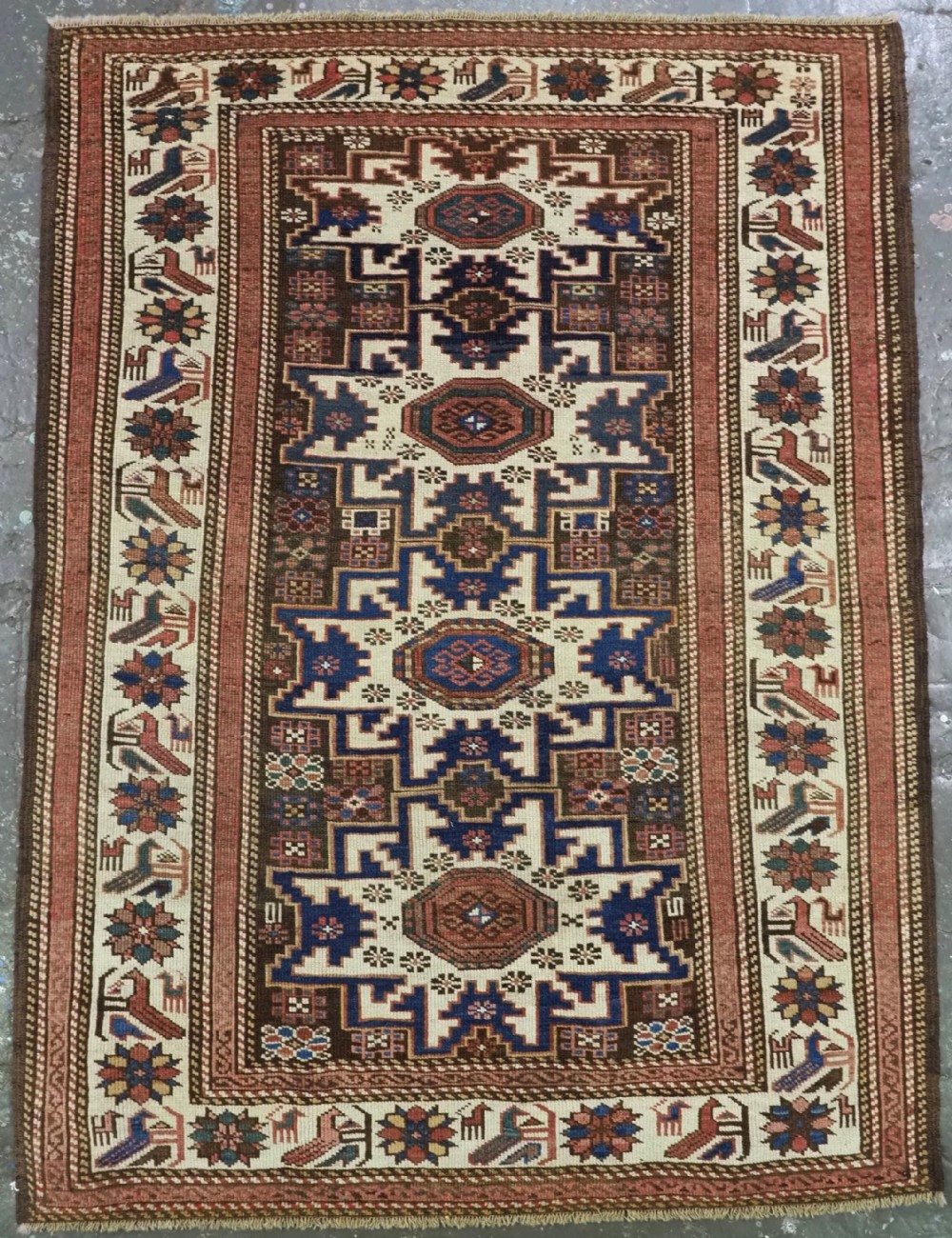 antique caucasian lesghi star rug with unusual shirvan baku bird border circa 1890