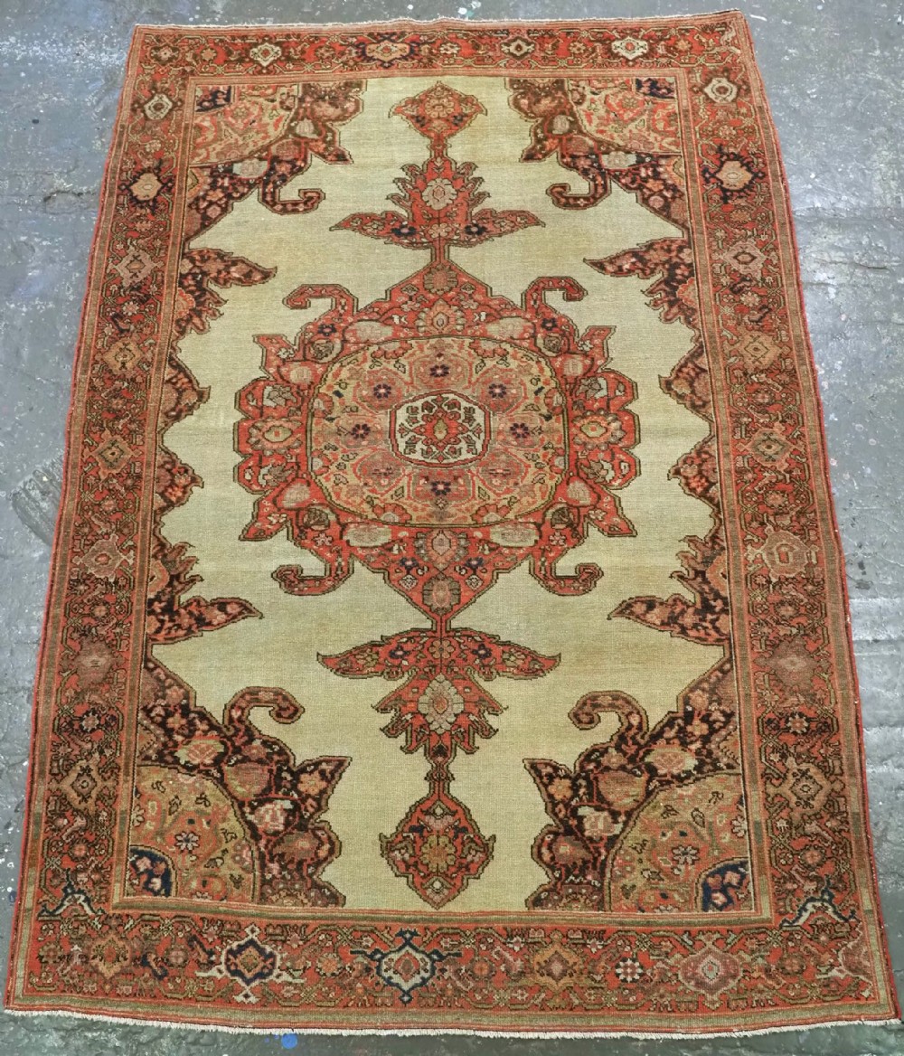 antique malayer rug with cream ground soft colour palette circa 1900