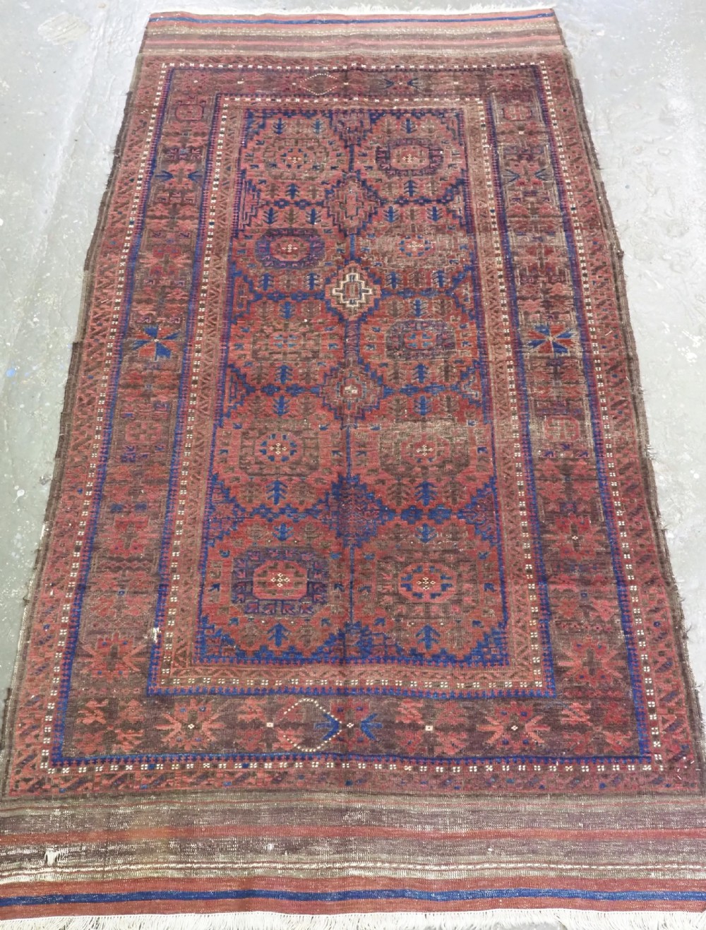 antique timuri or baluch tribal small main carpet medallion design circa 1880 or earlier