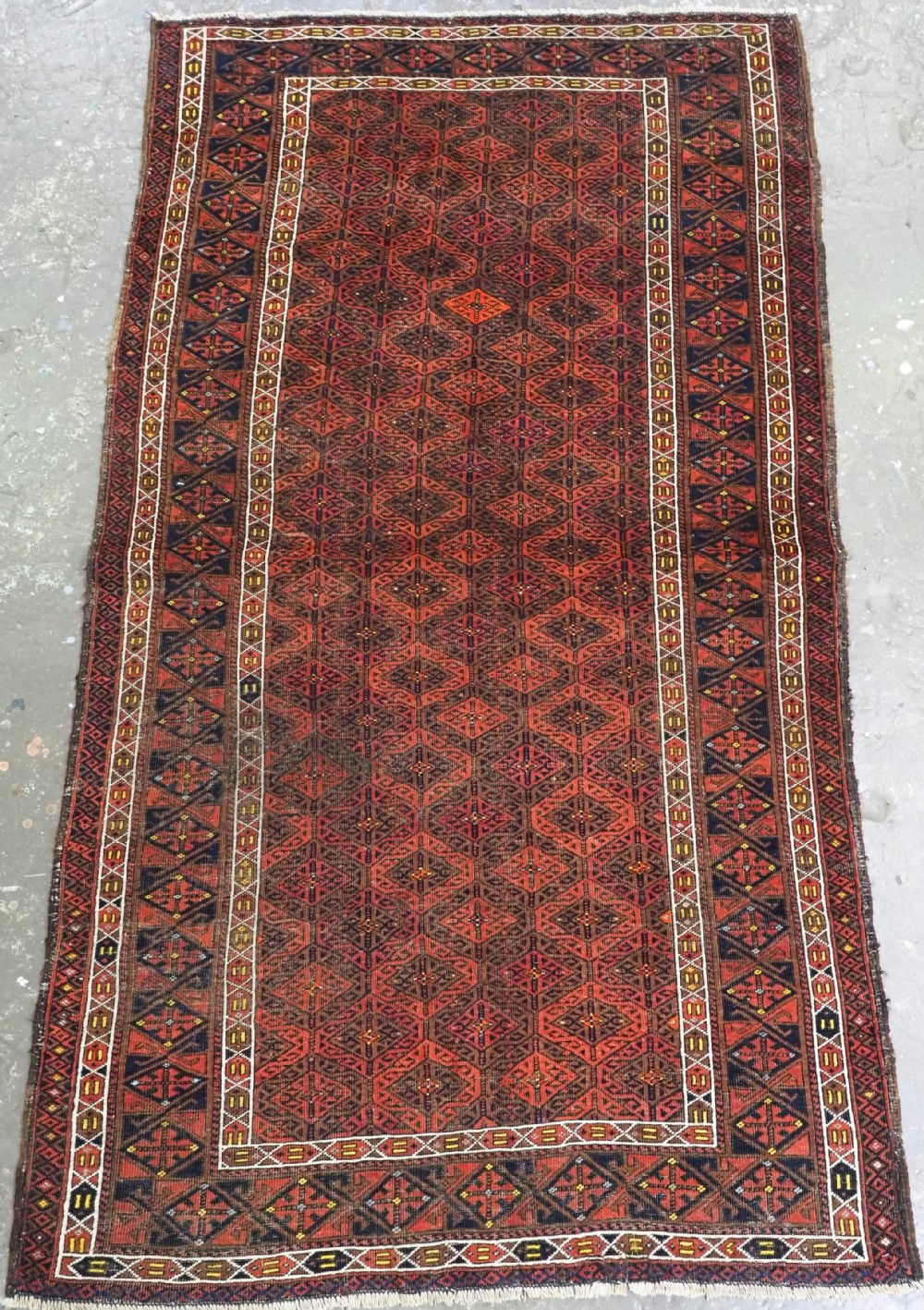 antique baluch rug with fine lattice design khorasan region circa 1880