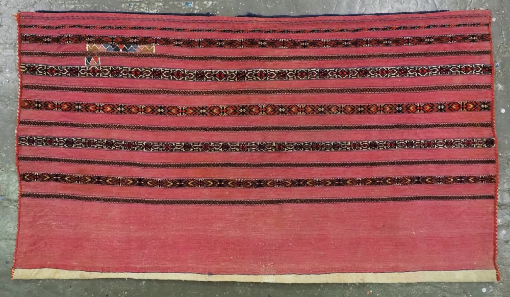 antique tekke turkmen 'kizil' chuval very fine weave complete with back circa 1880